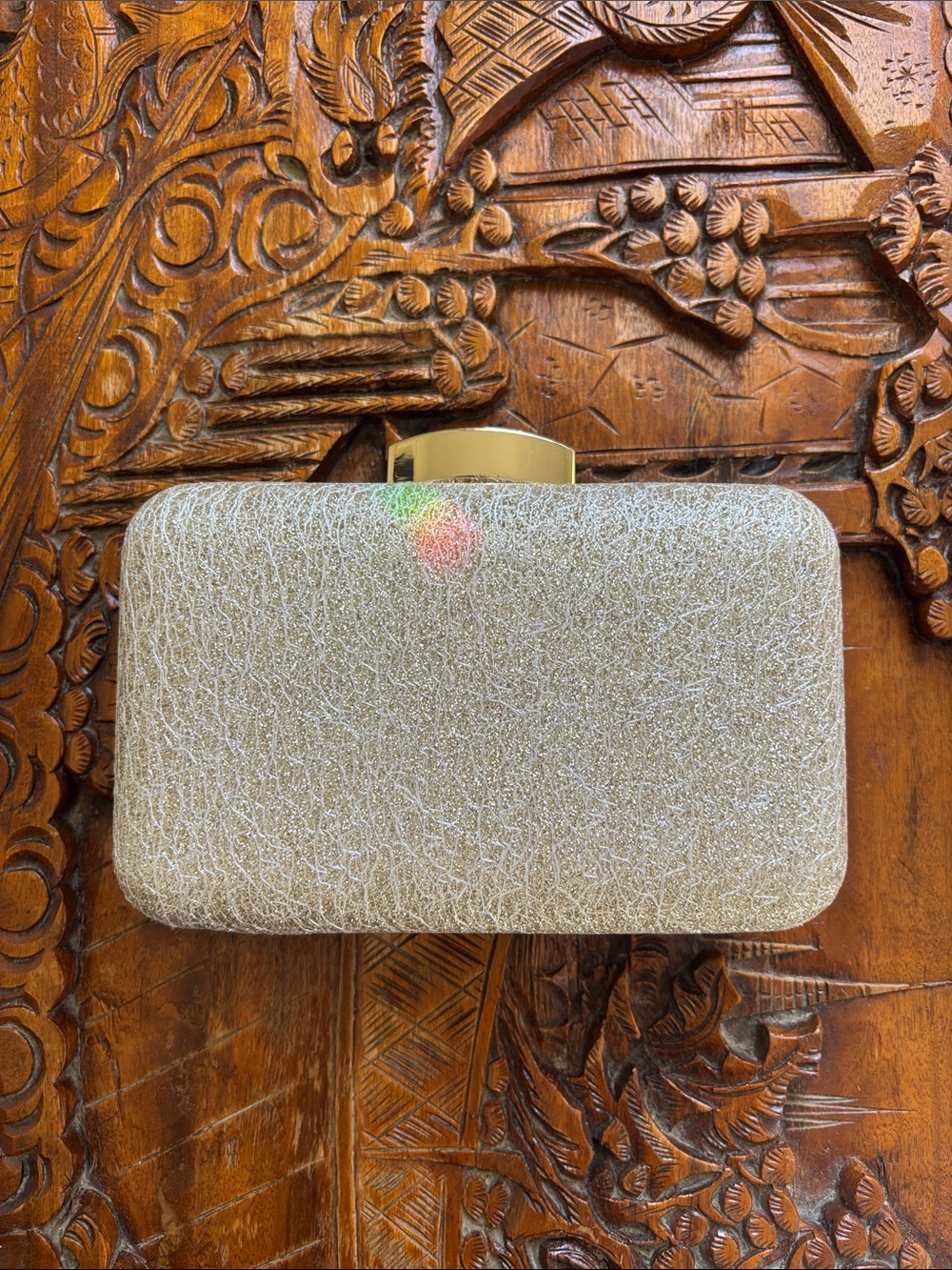 Light gold glittery clutch